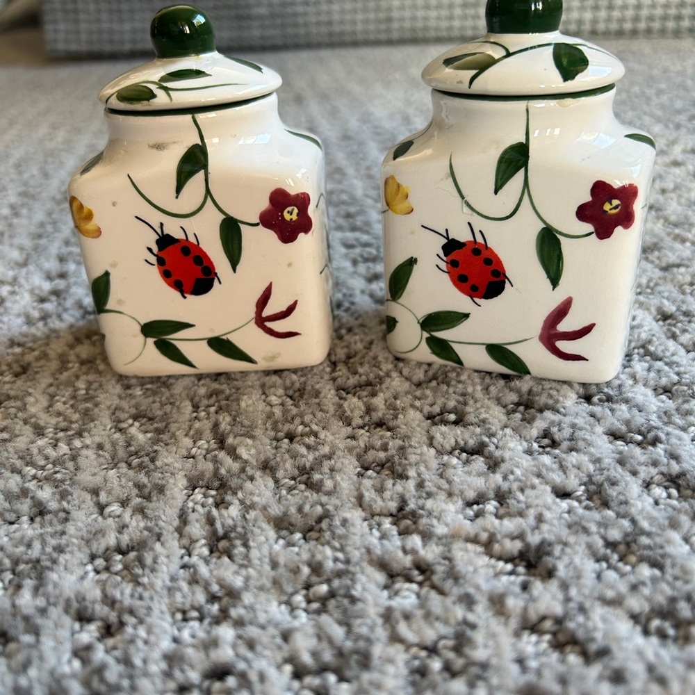 2 of the six replacement Ceramic Canisters with the Butterfly,collection.